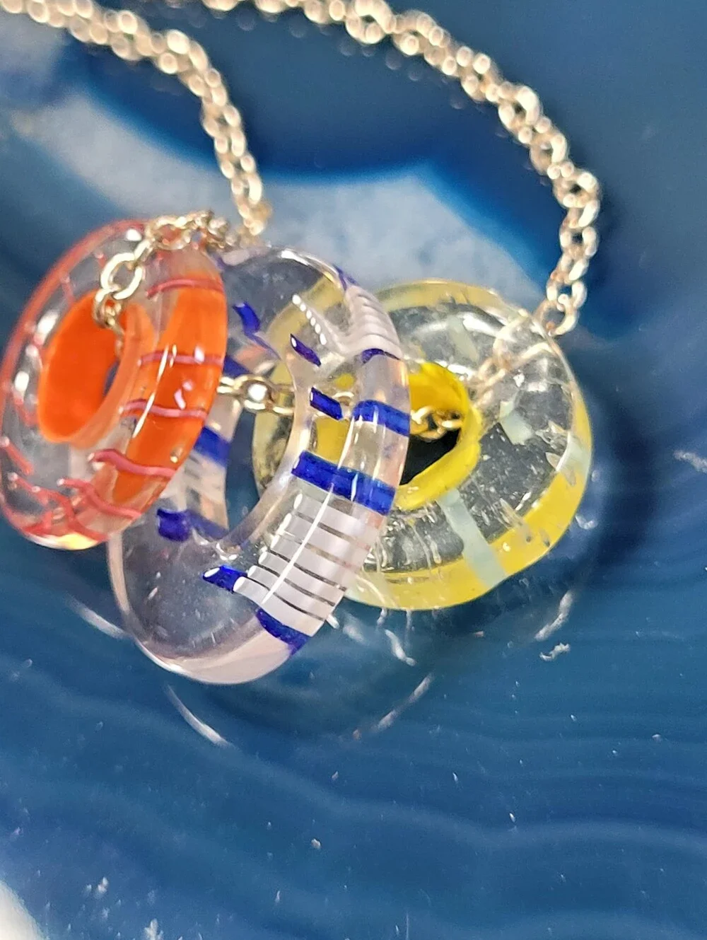 Silver Chain Necklace with Multicolor Three Glass Ring Pendants.